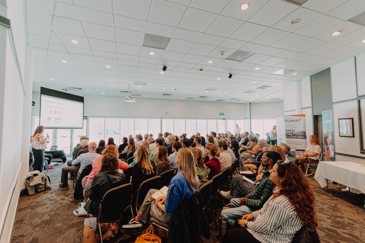A conference room full of people